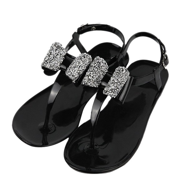 shiny black flip flops